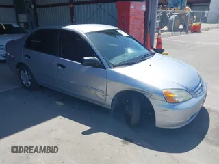 2001 Honda Civic LX with VIN 2HGES15541H585531, listed as a IAAI auction lot 42084501 with 229,328 mi miles. Bid and sale history available at carsss.com. Image 1.