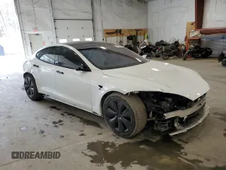 2024 Tesla Model S with VIN 5YJSA1E56RF538488, listed as a Copart auction lot 54702885 with 9,470 mi miles and Salvage title. Bid and sale history available at DreamBid. Image 4.