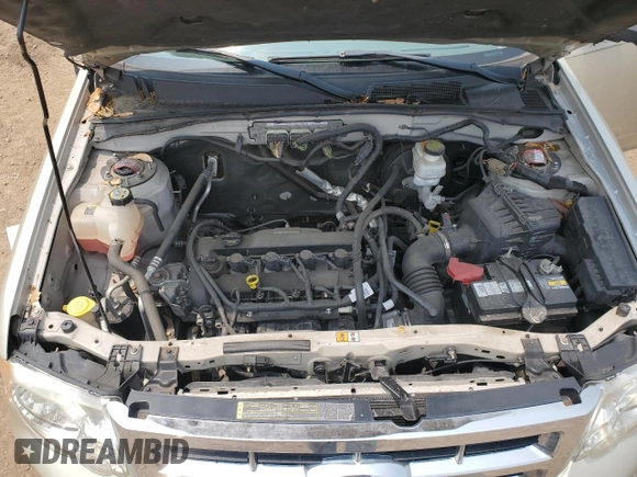2011 Ford Escape XLS with VIN 1FMCU0C75BKC58172, listed as a Copart auction lot 60492825 with 114,518 mi miles and Salvage title. Bid and sale history available at DreamBid. Image 11.