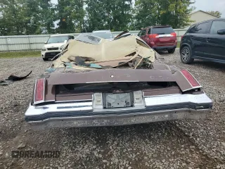 1977 Oldsmobile Cutlass z VIN 3J57R7M186772, wystawiony jako Copart lot #70648914 z przebiegiem 43 326 mil mil oraz Szkody całkowita. Historia ofert i sprzedaży dostępna na DreamBid. Obrazek 6.