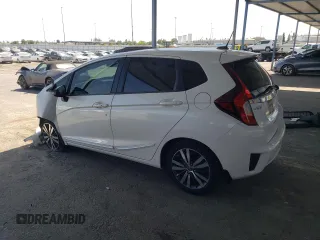 2015 Honda Fit EX-L с VIN 3HGGK5H86FM768802, выставлен на аукционе Copart как лот 58940725 с пробегом Не указан миль и Списание • Salvage title. История ставок и продаж доступна на DreamBid. Изображение 2.