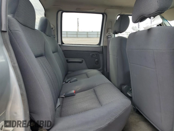 2002 Nissan Frontier SE with VIN 1N6ED27T92C379360, listed as a Copart auction lot 51235495 with 230,598 mi miles and Salvage title. Bid and sale history available at DreamBid. Image 10.