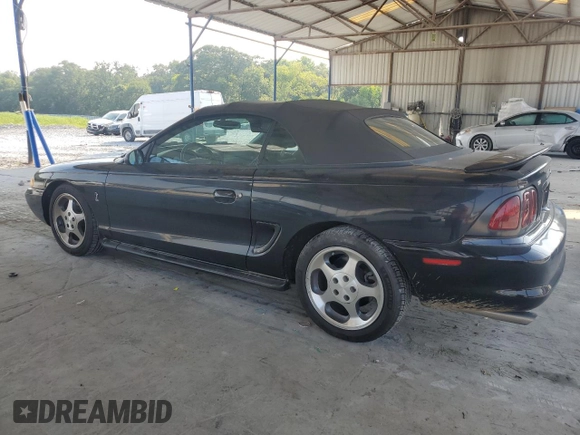 1996 Ford Mustang Cobra with VIN 1FALP46V0TF188786, listed as a Copart auction lot 57933355 with 36,931 mi miles and Salvage title. Bid and sale history available at DreamBid. Image 2.