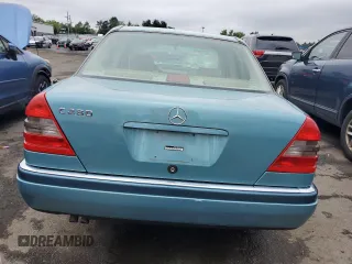 1994 Mercedes-Benz C 230/260/280/320 with VIN WDBHA28E8RF098148, listed as a Copart auction lot 60884345 with 238,600 mi miles and Salvage title. Bid and sale history available at DreamBid. Image 6.