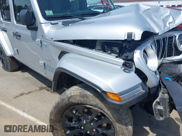 2024 Jeep Wrangler Sahara with VIN 1C4RJXP60RW292136, listed as a IAAI auction lot 42280063 with 26,701 mi miles and . Bid and sale history available at DreamBid. Image 17.