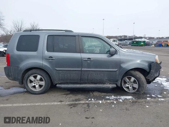 2011 Honda Pilot EX-L with VIN 5FNYF4H65BB009279, listed as a IAAI auction lot 41554301 with 226,337 mi miles and . Bid and sale history available at carsss.com. Image 13.