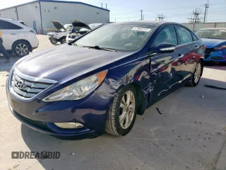 2013 Hyundai Sonata Limited z VIN 5NPEC4AC1DH609717, wystawiony jako Copart lot #57966315 z przebiegiem 143 621 mil mil oraz Szkoda całkowita • Salvage title. Historia ofert i sprzedaży dostępna na DreamBid. Obrazek 1.