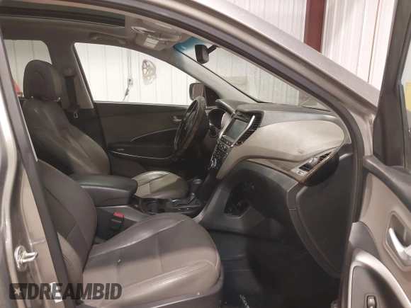 2017 Hyundai Santa Fe 2.4L z VIN 5XYZUDLBXHG447389, wystawiony jako IAAI lot #42249551 z przebiegiem 178 084 mil mil oraz . Historia ofert i sprzedaży dostępna na DreamBid. Obrazek 5.