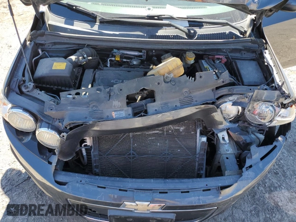 2012 Chevrolet Sonic LS z VIN 1G1JA6SHXC4171044, wystawiony jako Copart lot #45956415 z przebiegiem 133 324 mil mil oraz Szkoda całkowita • Salvage title. Historia ofert i sprzedaży dostępna na DreamBid. Obrazek 13.