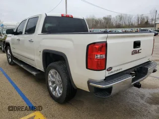 2014 GMC Sierra 1500 SLT with VIN 3GTU2VEC1EG382439, listed as a Copart auction lot 51769985 with 124,125 mi miles and Salvage Title. Bid and sale history available at DreamBid. Image 2.