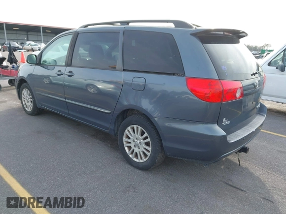 2009 Toyota Sienna XLE with VIN 5TDBK22C79S026370, listed as a IAAI auction lot 41471005 with 200,720 mi miles and . Bid and sale history available at DreamBid. Image 3.