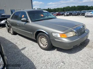 2002 Mercury Grand Marquis GS with VIN 2MEFM74W72X653479, listed as a Copart auction lot 68020344 with 220,827 mi miles and Salvage Title. Bid and sale history available at carsss.com. Image 4.
