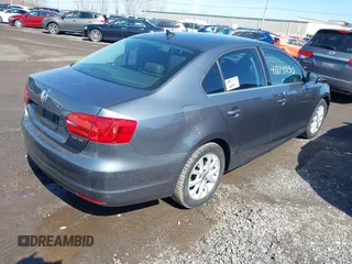 2013 Volkswagen Jetta SE with VIN 3VWDP7AJXDM427960, listed as a IAAI auction lot 41814030 with 105,287 mi miles and . Bid and sale history available at DreamBid. Image 4.