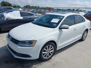 2014 Volkswagen Jetta SE with VIN 3VWD07AJ2EM444256, listed as a IAAI auction lot 42383287 with 99,654 mi miles and . Bid and sale history available at DreamBid. Image 2.