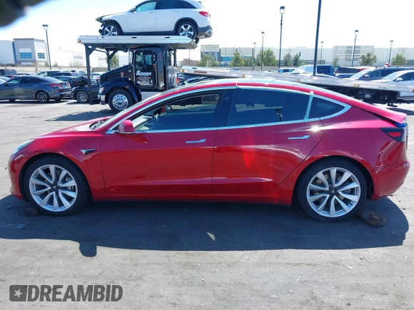 2018 Tesla Model 3 Long Range Battery with VIN 5YJ3E1EB5JF146184, listed as a IAAI auction lot 41808346 with 97,496 mi miles and . Bid and sale history available at DreamBid. Image 15.