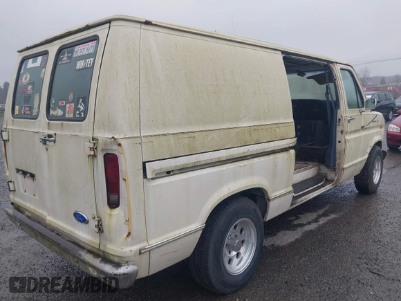 1990 Ford Econoline Cargo with VIN 1FTDE14N0LHA80405, listed as a IAAI auction lot 41824747 with 91,278 mi miles and . Bid and sale history available at DreamBid. Image 4.