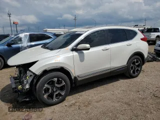 2018 Honda CR-V Touring with VIN 5J6RW2H90JL019968, listed as a Copart auction lot 62358335 with 188,397 mi miles and Salvage title. Bid and sale history available at DreamBid. Image 1.