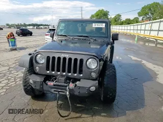 2017 Jeep Wrangler Willys Wheeler with VIN 1C4AJWAG2HL527192, listed as a Copart auction lot 58169245 with 88,737 mi miles and Salvage title. Bid and sale history available at DreamBid. Image 15.