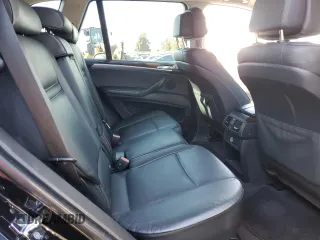 2008 BMW X5 3.0si z VIN 5UXFE43598L001053, wystawiony jako Copart lot #56243905 z przebiegiem 118 089 mil mil oraz Szkoda całkowita • Salvage title. Historia ofert i sprzedaży dostępna na DreamBid. Obrazek 11.