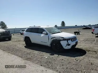 2017 Jeep Grand Cherokee Laredo z VIN 1C4RJFAG6HC618162, wystawiony jako Copart lot #56150195 z przebiegiem 133 766 mil mil oraz Szkoda całkowita • Salvage title. Historia ofert i sprzedaży dostępna na DreamBid. Obrazek 14.