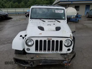 2016 Jeep Wrangler Unlimited Sahara with VIN 1C4BJWEGXGL245041, listed as a Copart auction lot 88099245 with 134,768 mi miles and Salvage title. Bid and sale history available at DreamBid. Image 5.