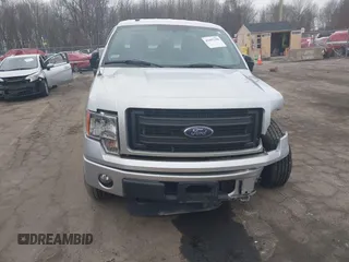 2014 Ford F-150 XL with VIN 1FTFX1EF2EFC81067, listed as a IAAI auction lot 41697190 with 105,584 mi miles. Bid and sale history available at carsss.com. Image 12.