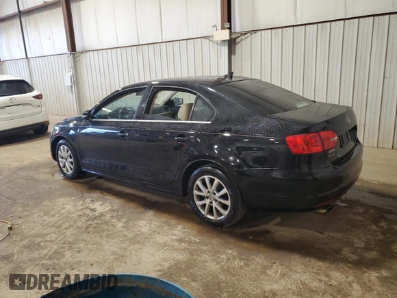 2014 Volkswagen Jetta SE with VIN 3VWD17AJ6EM387167, listed as a Copart auction lot 52251955 with 150,441 mi miles and Salvage title. Bid and sale history available at DreamBid. Image 2.