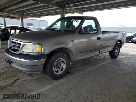 2002 Ford F-150 XL with VIN 1FTRF17W62NB40159, listed as a Copart auction lot 49010765 with 166,719 mi miles and Salvage Title. Bid and sale history available at carsss.com. Image 1.