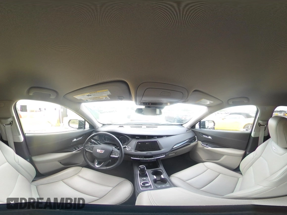 2023 Cadillac XT4 FWD Premium Luxury with VIN 1GYFZCR44PF170452, listed as a IAAI auction lot 42084960 with 22,212 mi miles and . Bid and sale history available at DreamBid. Image 18.