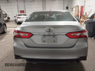 2019 Toyota Camry LE z VIN 4T1B11HK5KU814007, wystawiony jako IAAI lot #42099677 z przebiegiem 91 779 mil mil oraz . Historia ofert i sprzedaży dostępna na DreamBid. Obrazek 16.