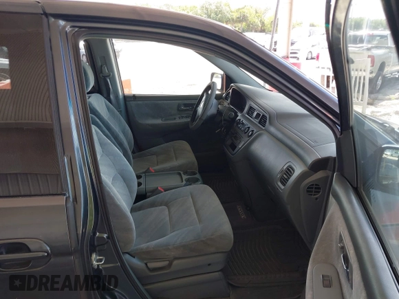 2004 Honda Odyssey EX with VIN 5FNRL18624B056333, listed as a IAAI auction lot 42143860 with 165,687 mi miles and . Bid and sale history available at DreamBid. Image 5.