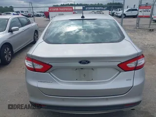 2016 Ford Fusion SE z VIN 3FA6P0H72GR296906, wystawiony jako IAAI lot #42571597 z przebiegiem 242 623 mil mil oraz . Historia ofert i sprzedaży dostępna na DreamBid. Obrazek 16.