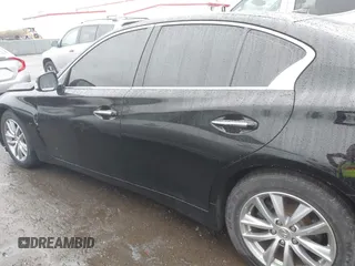2015 Infiniti Q50 Premium with VIN JN1BV7AP9FM349709, listed as a IAAI auction lot 41976089 with 62,094 mi miles and . Bid and sale history available at DreamBid. Image 14.