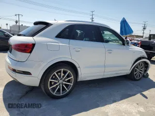 2018 Audi Q3 Premium Plus with VIN WA1HCCFS0JR008529, listed as a Copart auction lot 54701695 with 54,391 mi miles and Salvage title. Bid and sale history available at DreamBid. Image 3.