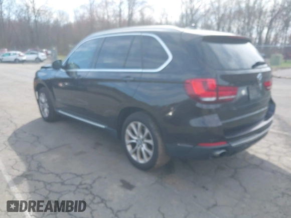 2014 BMW X5 xDrive35i with VIN 5UXKR0C57E0H20944, listed as a IAAI auction lot 42011451 with 208,205 mi miles. Bid and sale history available at carsss.com. Image 3.