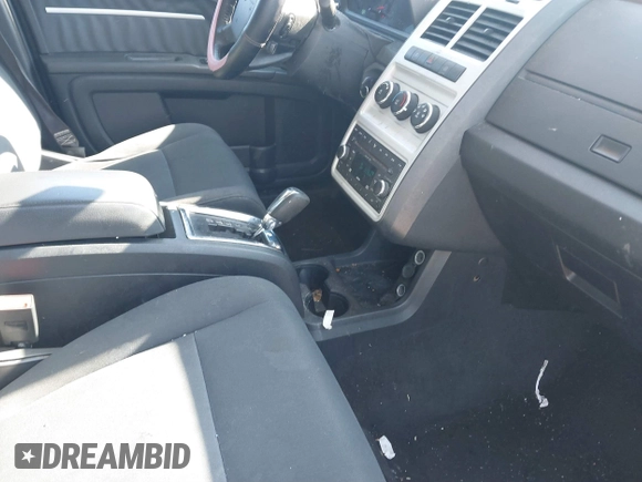 2010 Dodge Journey SXT with VIN 3D4PH5FVXAT107023, listed as a IAAI auction lot 41747572 with 165,568 mi miles and . Bid and sale history available at DreamBid. Image 5.