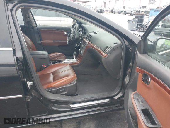 2007 Saturn Aura XR z VIN 1G8ZV57707F297880, wystawiony jako IAAI lot #42160108 z przebiegiem 150 434 mil mil oraz . Historia ofert i sprzedaży dostępna na DreamBid. Obrazek 5.
