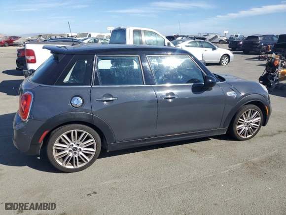 2015 MINI Cooper Hardtop 4 Door S with VIN WMWXU3C59F2B65795, listed as a Copart auction lot 75768864 with 120,979 mi miles and Salvage Title. Bid and sale history available at carsss.com. Image 3.