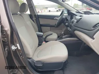 2013 Kia Forte EX with VIN KNAFU4A22D5711825, listed as a IAAI auction lot 42128778 with 112,889 mi miles. Bid and sale history available at carsss.com. Image 5.