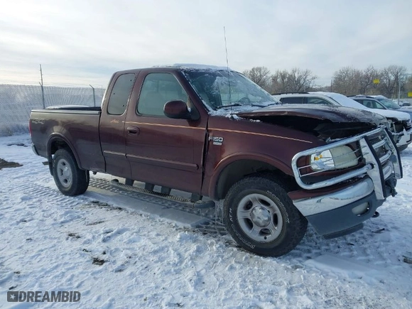 2000 Ford F-150 XL with VIN 1FTRX18L2YNA50128, listed as a IAAI auction lot 40956879 with 1 mi miles. Bid and sale history available at carsss.com. Image 1.