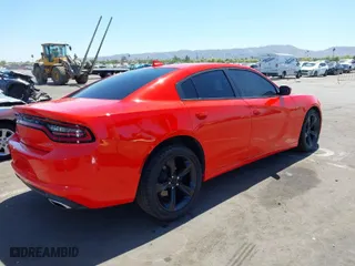 2018 Dodge Charger SXT Plus with VIN 2C3CDXHG5JH113598, listed as a IAAI auction lot 39149530 with 106140 miles. Bid and sale history available at carsss.com. Image 4.