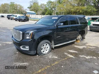 2015 GMC Yukon SLT with VIN 1GKS1BKC0FR113013, listed as a Copart auction lot 49821495 with 294,596 mi miles and Salvage Title. Bid and sale history available at carsss.com. Image 1.