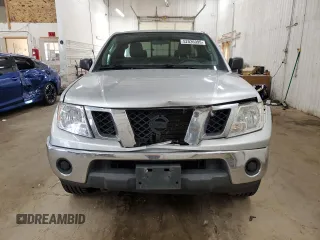 2010 Nissan Frontier SE with VIN 1N6AD0CW0AC429029, listed as a Copart auction lot 52036995 with 180,166 mi miles and Salvage title. Bid and sale history available at DreamBid. Image 5.