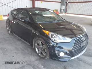 2015 Hyundai Veloster Turbo with VIN KMHTC6AEXFU231812, listed as a IAAI auction lot 42384260 with 77,839 mi miles and . Bid and sale history available at DreamBid. Image 1.