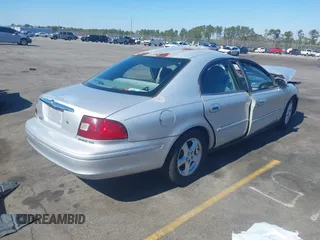2003 Mercury Sable GS z VIN 1MEFM50U83A608330, wystawiony jako IAAI lot #41652880 z przebiegiem 218 651 mil mil oraz . Historia ofert i sprzedaży dostępna na DreamBid. Obrazek 4.