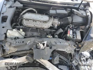 2005 Acura RL z VIN JH4KB16565C019863, wystawiony jako Copart lot #55317535 z przebiegiem 213 732 mil mil oraz Szkody całkowita. Historia ofert i sprzedaży dostępna na DreamBid. Obrazek 11.