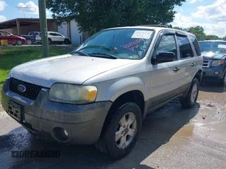 2006 Ford Escape XLT with VIN 1FMYU93106KA12173, listed as a IAAI auction lot 42176724 with 219,471 mi miles and . Bid and sale history available at DreamBid. Image 2.