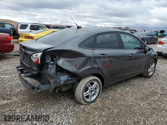 2018 Ford Fiesta SE z VIN 3FADP4BJ1JM115298, wystawiony jako Copart lot #76737564 z przebiegiem Nie podano mil oraz Szkoda całkowita • Salvage title. Historia ofert i sprzedaży dostępna na DreamBid. Obrazek 3.