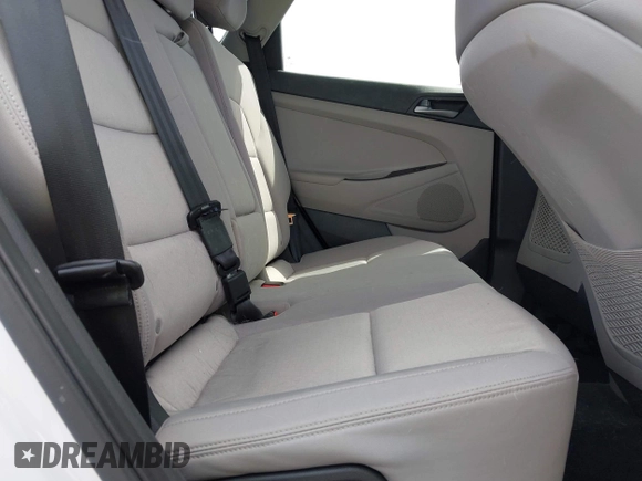 2017 Hyundai Tucson SE with VIN KM8J3CA44HU437644, listed as a IAAI auction lot 41825957 with 59,402 mi miles. Bid and sale history available at carsss.com. Image 8.