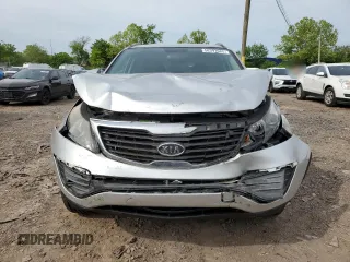 2012 Kia Sportage LX z VIN KNDPB3A29C7264856, wystawiony jako Copart lot #58397685 z przebiegiem 144 621 mil mil oraz Szkoda całkowita • Salvage title. Historia ofert i sprzedaży dostępna na DreamBid. Obrazek 5.